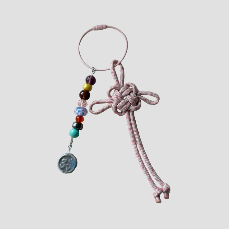 OM X LUCKY KNOT LOOP CHARM