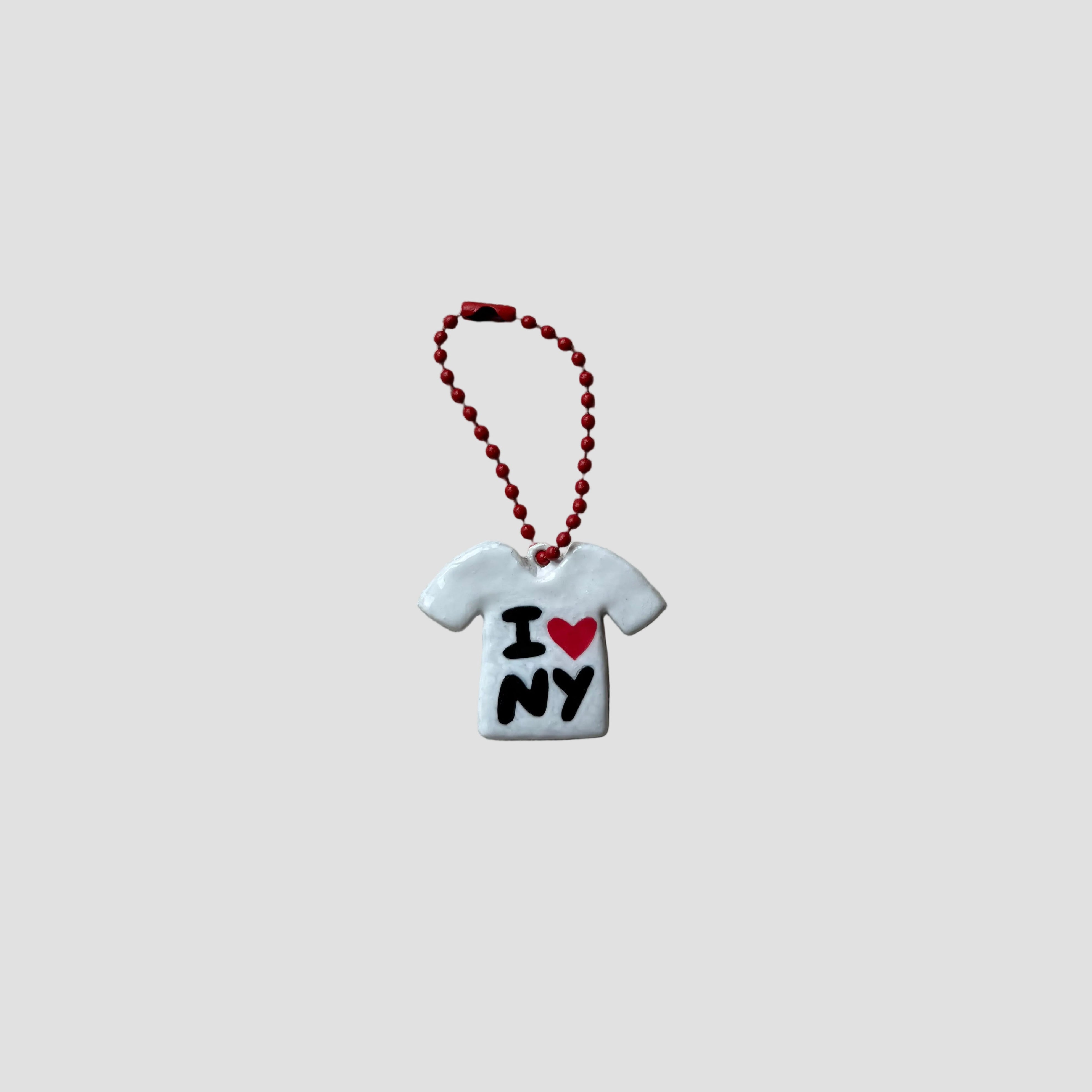 White t-shirt keychain with 'I ❤️ NY' text on a white background